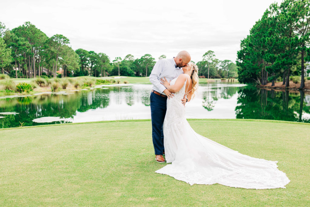 bride and groom kissing at sandestin golf and beach resort 30a wedding photography