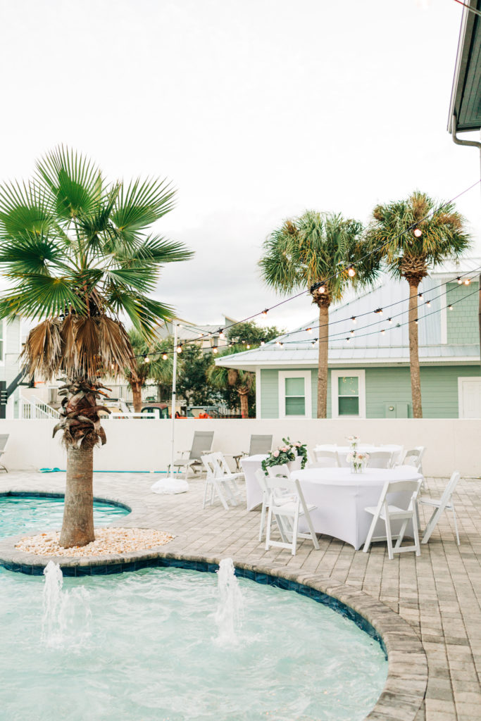 reception set up poolside at house in Miramar Beach