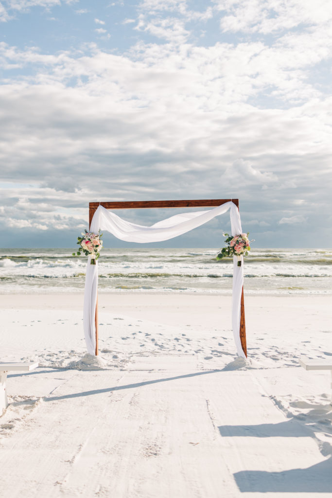 wedding ceremony arbor set up on Miramar Beach Florida 